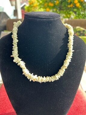Classic white puka shell necklace natural shell chips. Hawaiian surfer jewelry